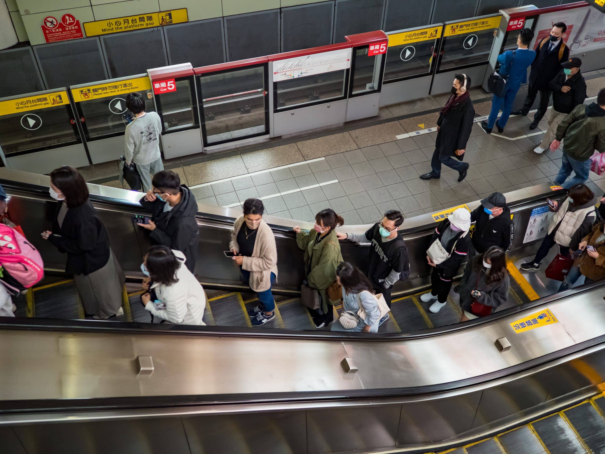 TAIPEI,TAIWAN - DEC 2 :Passengers in mass transit system on December 2,2021 in Taipei, Taiwan.